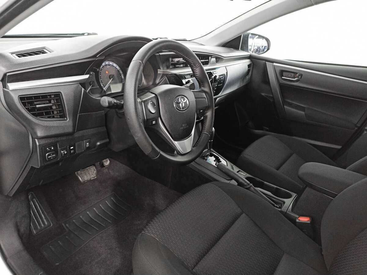 Toyota Corolla 2013 года с пробегом. Фото: #14