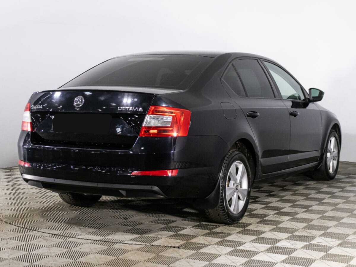 Skoda Octavia 2014 года с пробегом. Фото: #4