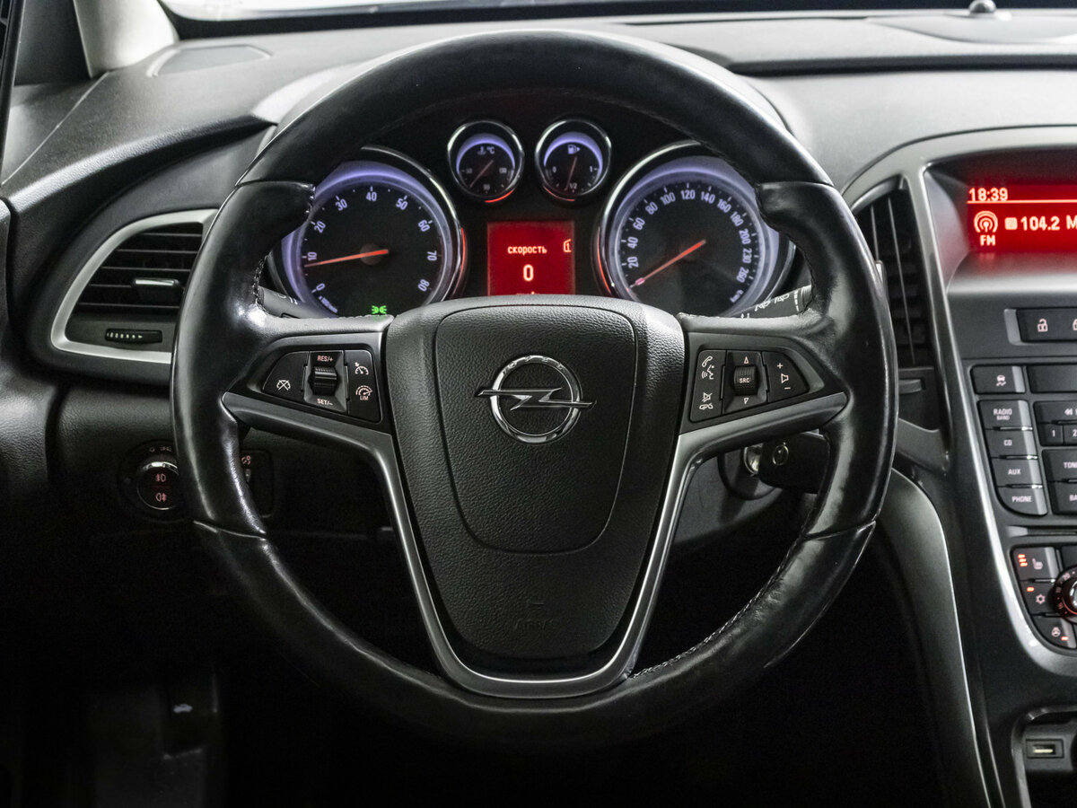 Opel Astra 2013 года с пробегом. Фото: #10