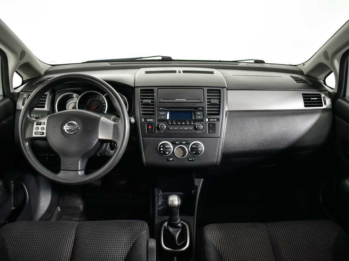 Nissan Tiida 2013 года с пробегом. Фото: #11