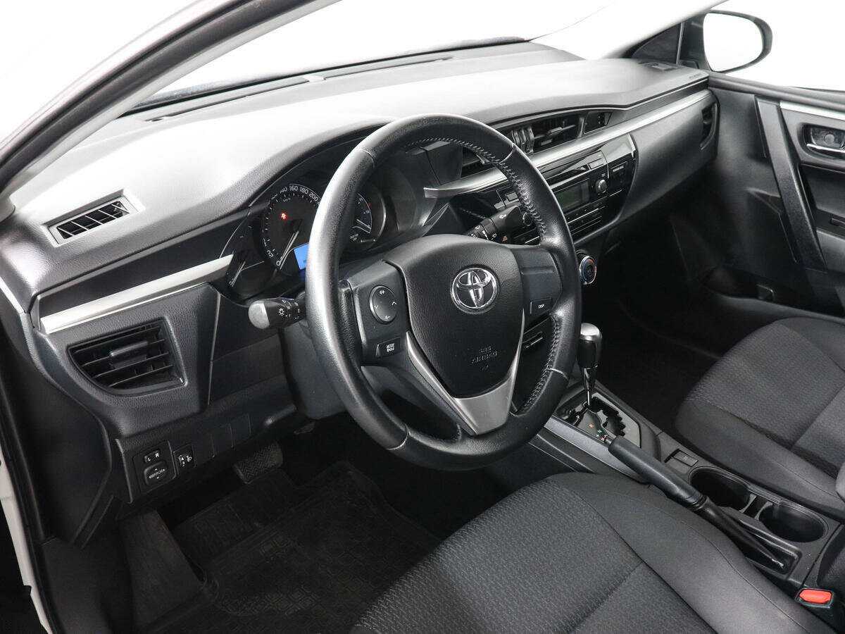 Toyota Corolla 2014 года с пробегом. Фото: #8