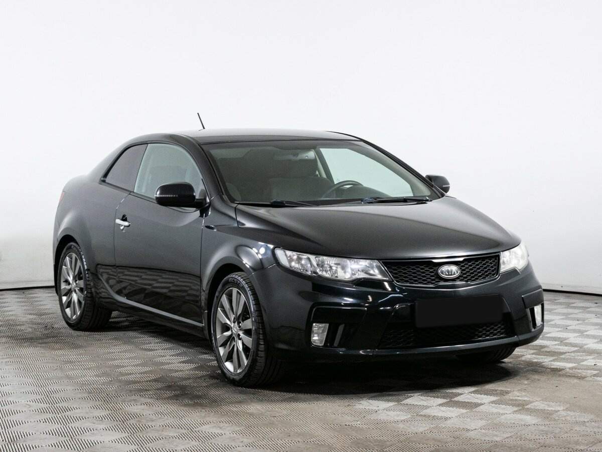 Kia Cerato 2012 года с пробегом. Фото: #2