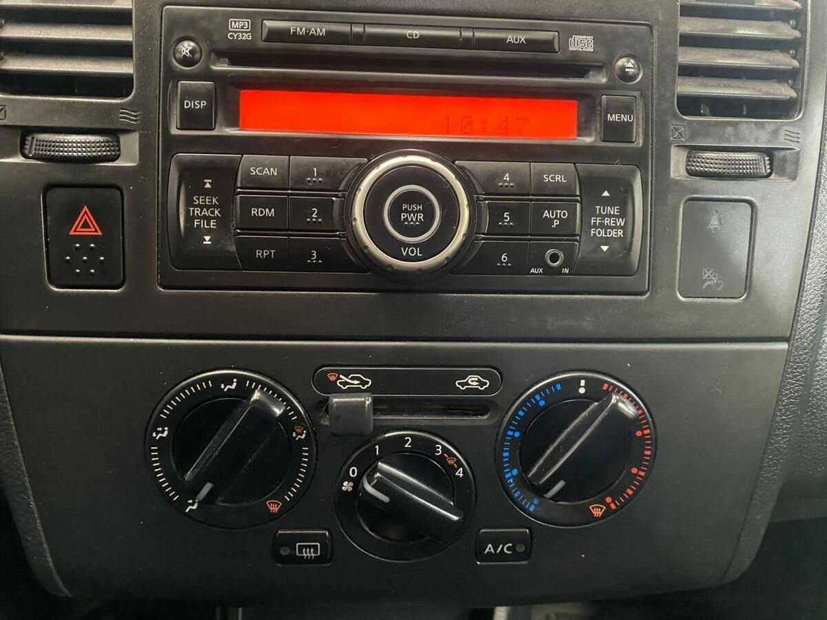 Nissan Tiida 2013 года с пробегом. Фото: #12