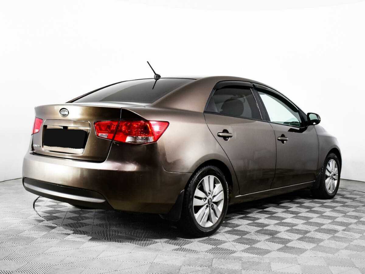 Kia Cerato 2012 года с пробегом. Фото: #4