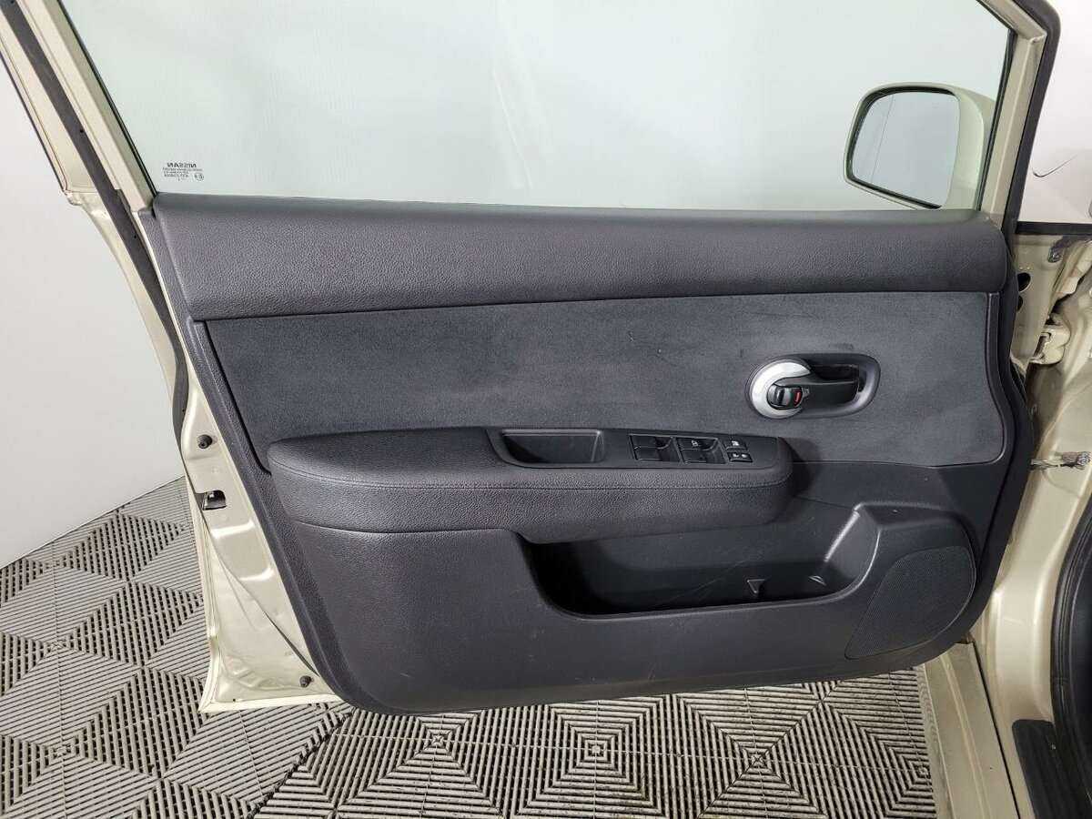 Nissan Tiida 2013 года с пробегом. Фото: #7