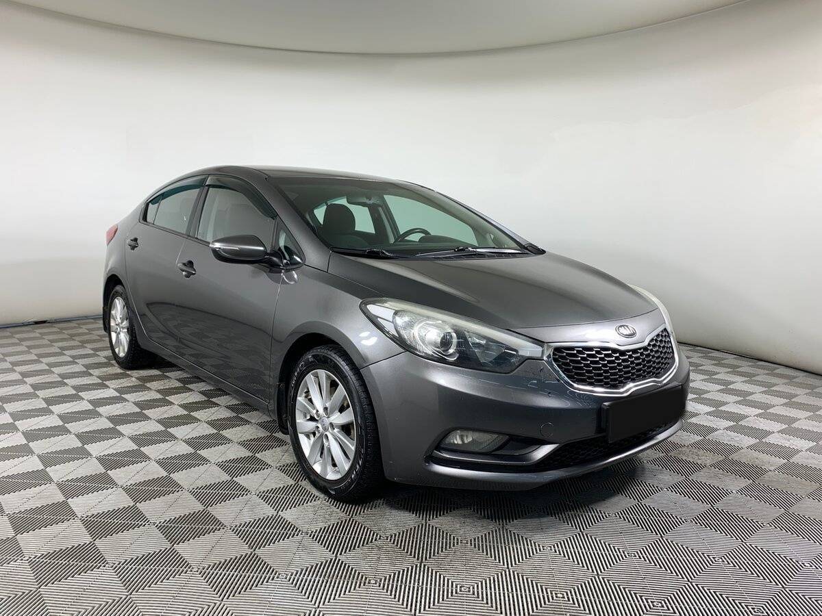 Kia Cerato 2013 года с пробегом. Фото: #2