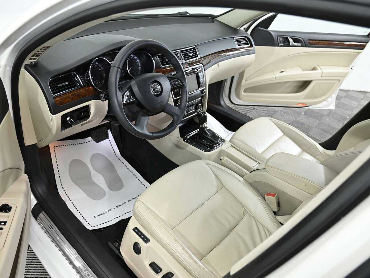 Skoda Superb 2013 года с пробегом. Фото: #9