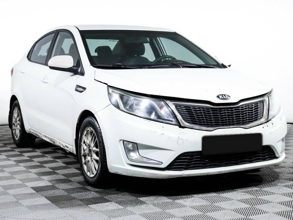 Kia Rio 2013 года с пробегом. Фото: #2