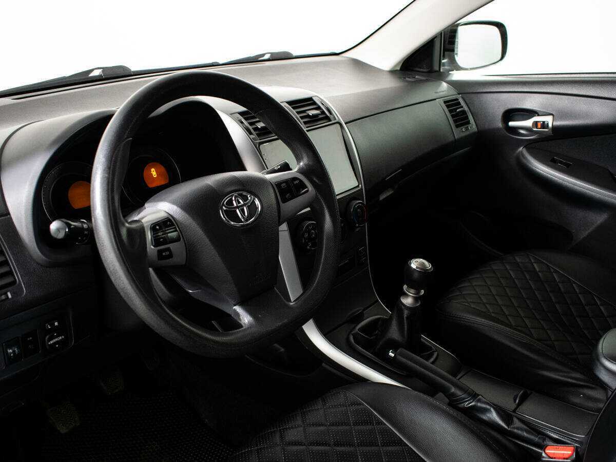 Toyota Corolla 2012 года с пробегом. Фото: #12