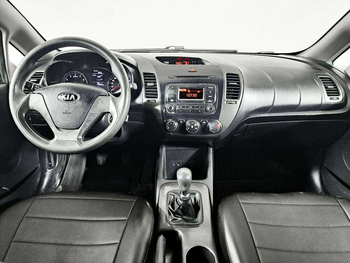 Kia Cerato 2013 года с пробегом. Фото: #9