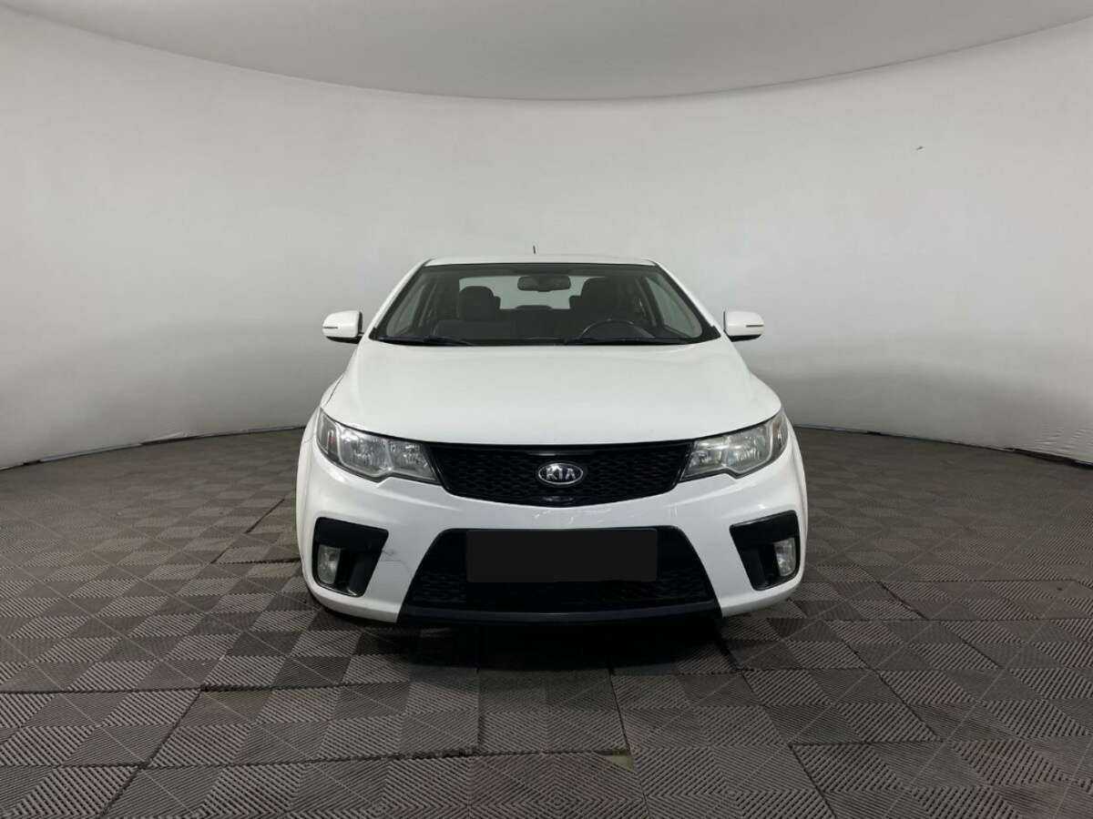 Kia Cerato 2012 года с пробегом. Фото: #1