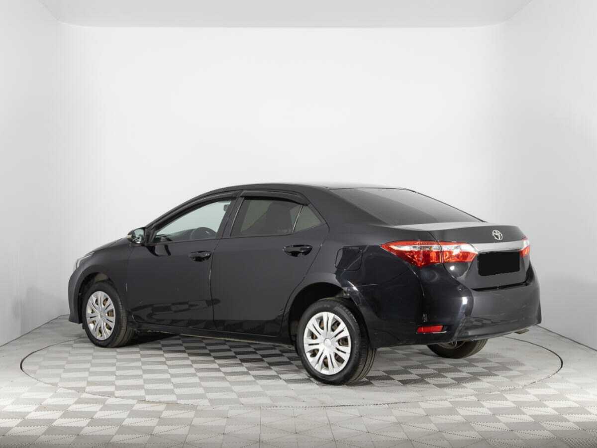Toyota Corolla 2014 года с пробегом. Фото: #6