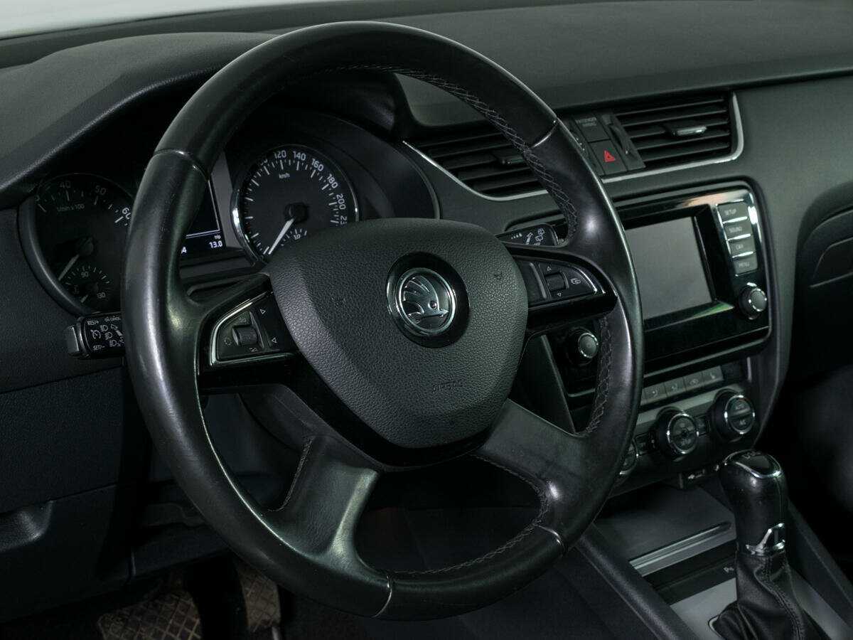 Skoda Octavia 2013 года с пробегом. Фото: #13
