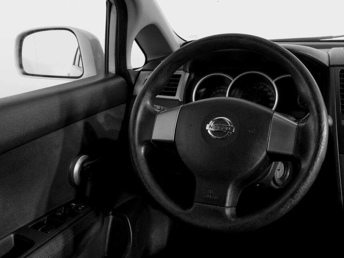 Nissan Tiida 2013 года с пробегом. Фото: #12