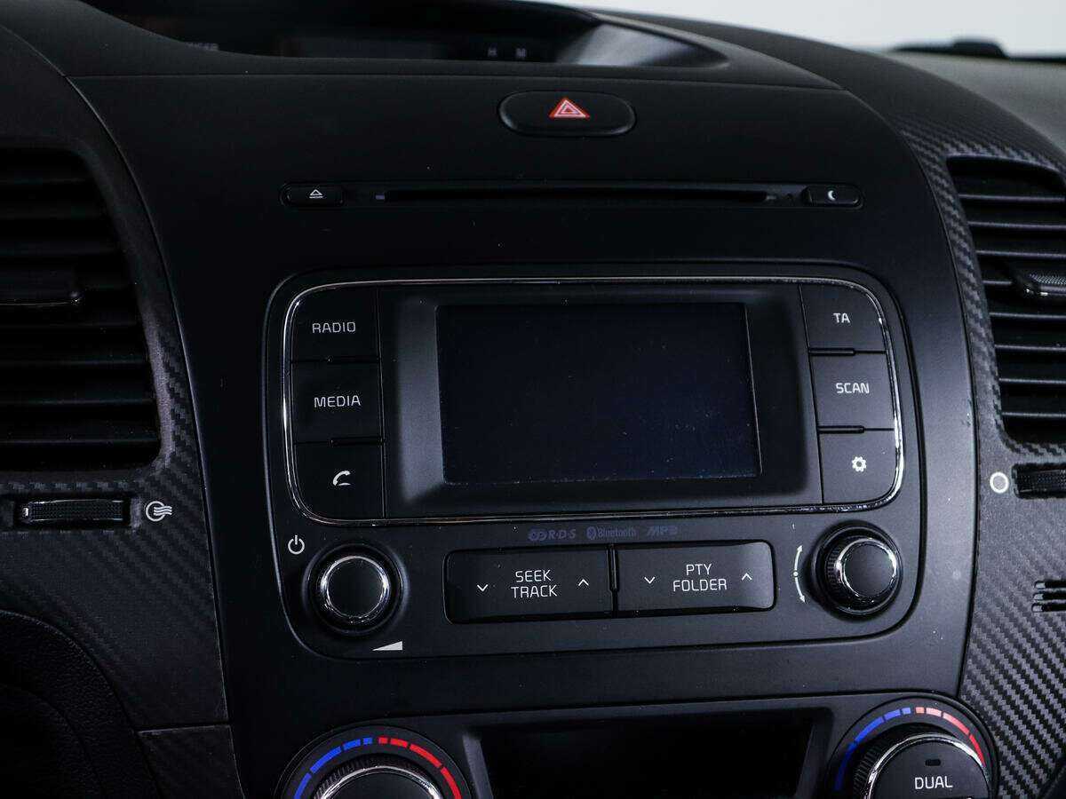 Kia Cerato 2013 года с пробегом. Фото: #20