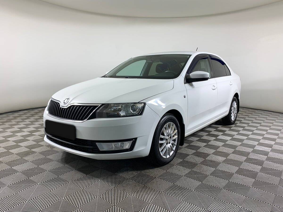 Skoda Rapid 2015 года с пробегом. Посмотреть фото