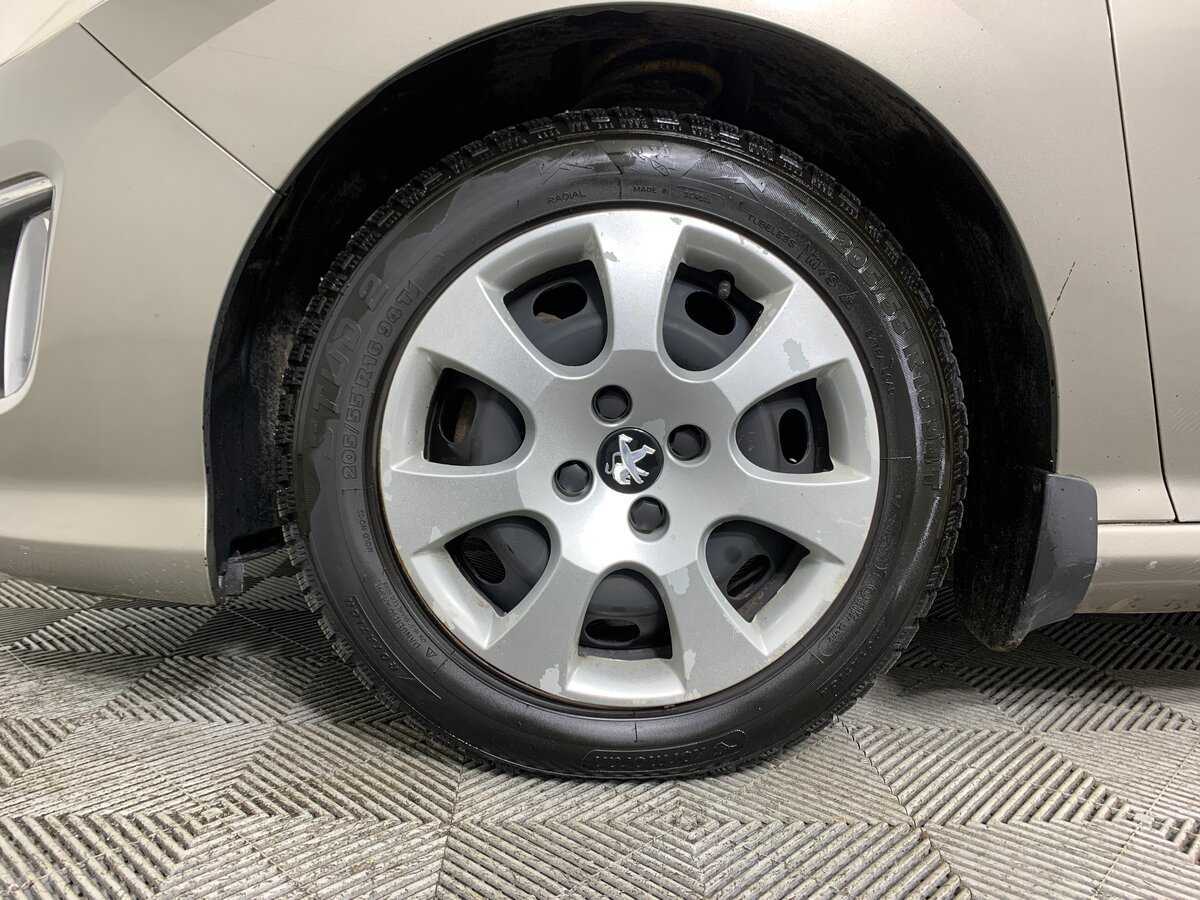 Peugeot 308 2012 года с пробегом. Фото: #8