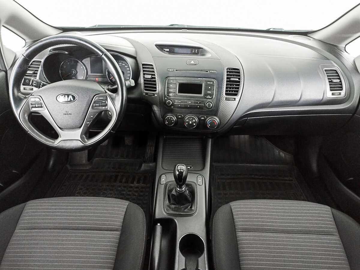 Kia Cerato 2013 года с пробегом. Фото: #11