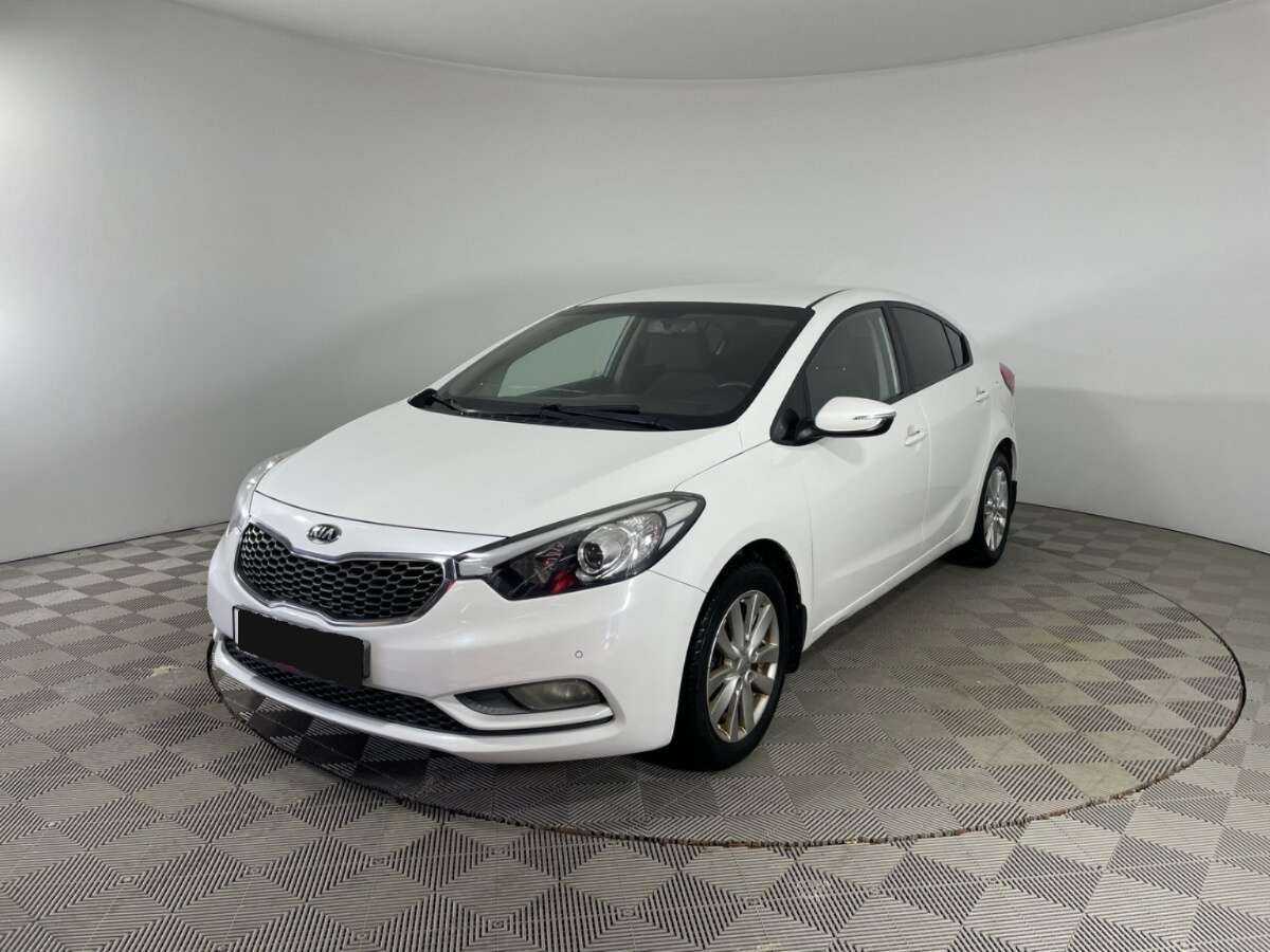 Kia Cerato 2014 года с пробегом. Посмотреть фото