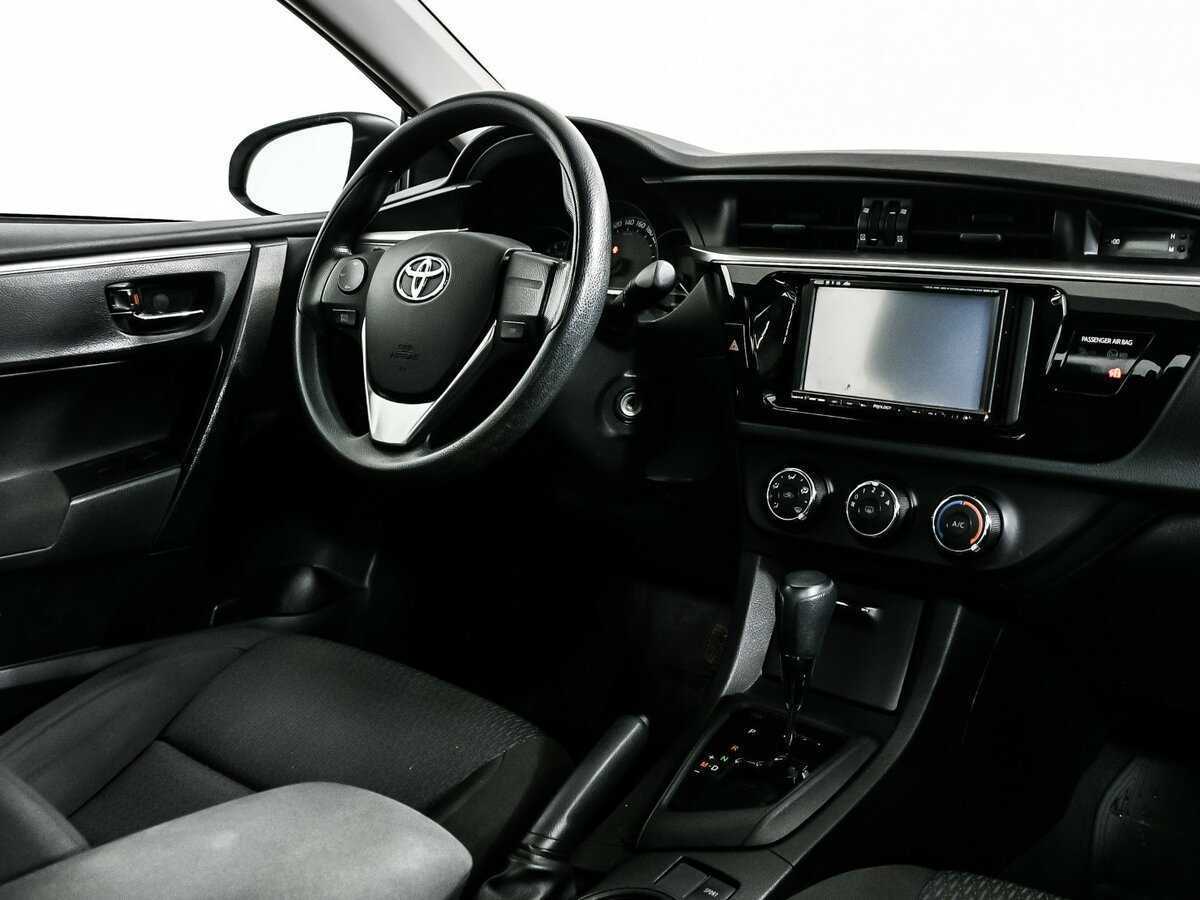 Toyota Corolla 2013 года с пробегом. Фото: #8