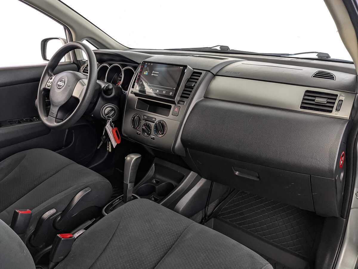 Nissan Tiida 2013 года с пробегом. Фото: #12