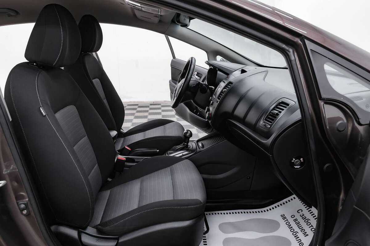 Kia Cerato 2013 года с пробегом. Фото: #11