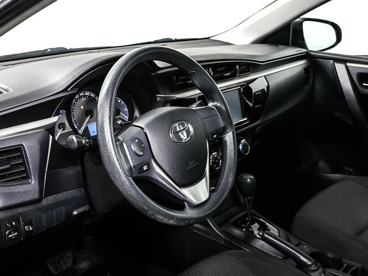 Toyota Corolla 2013 года с пробегом. Фото: #11