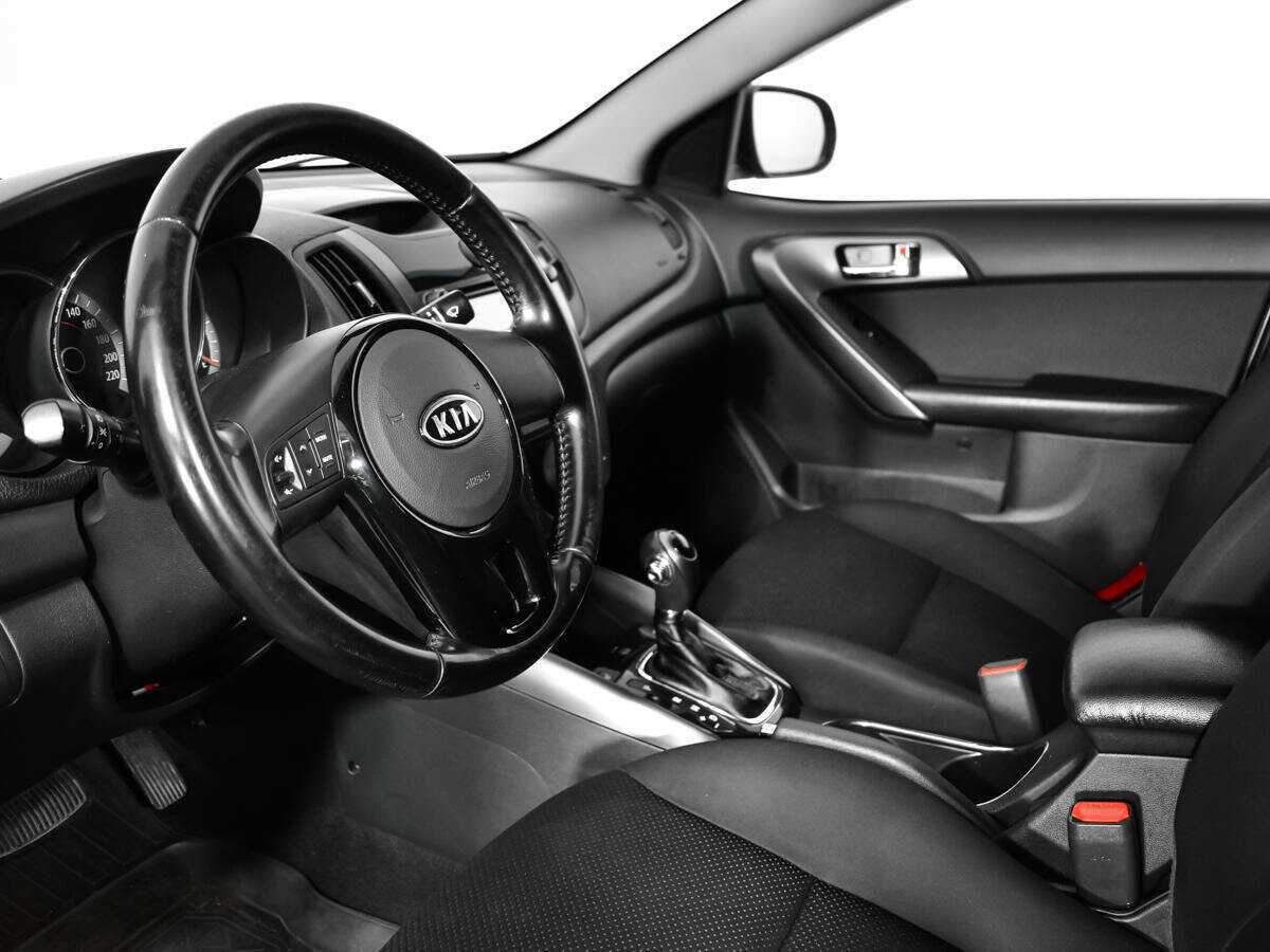 Kia Cerato 2012 года с пробегом. Фото: #12