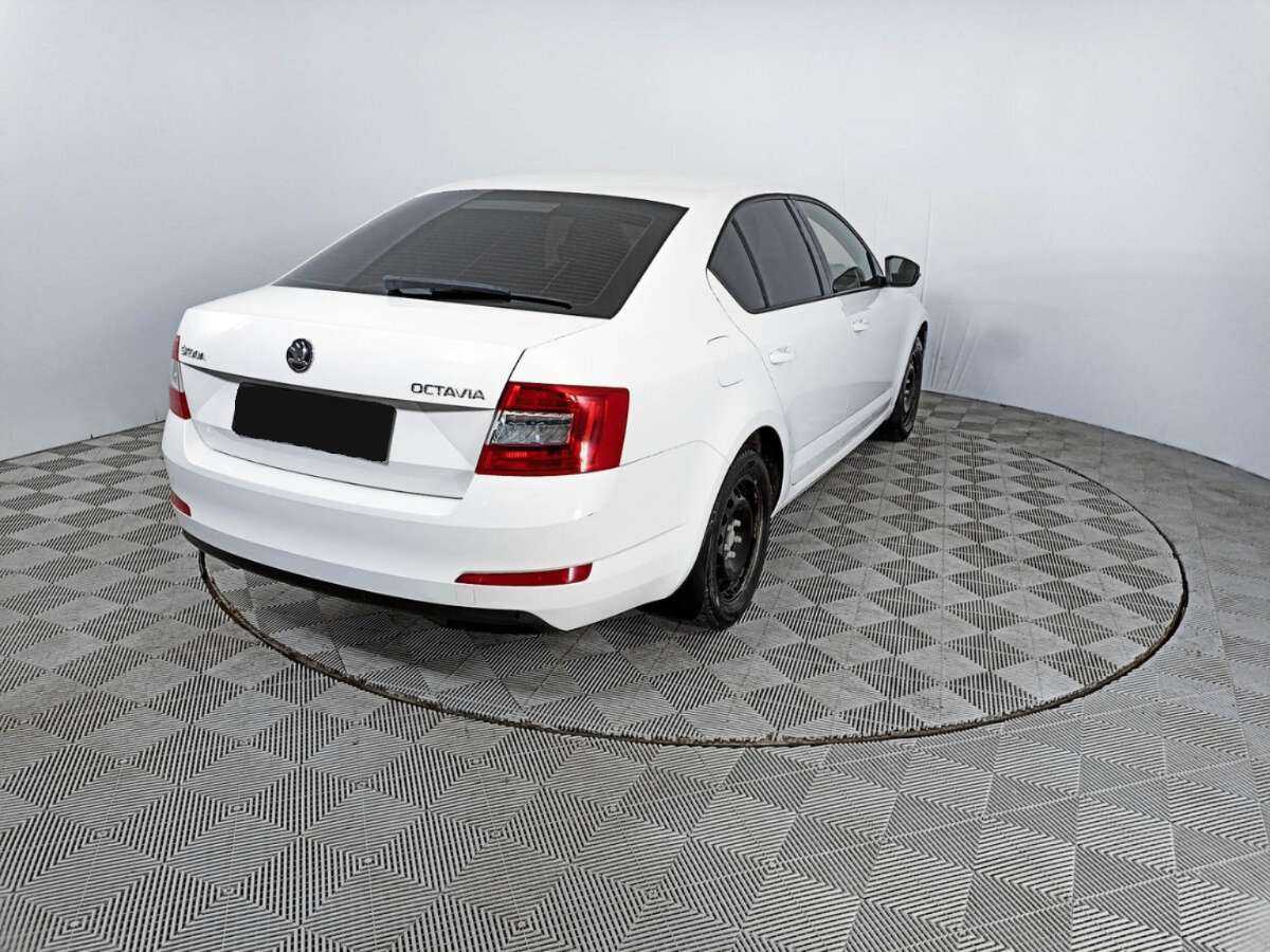 Skoda Octavia 2014 года с пробегом. Фото: #4