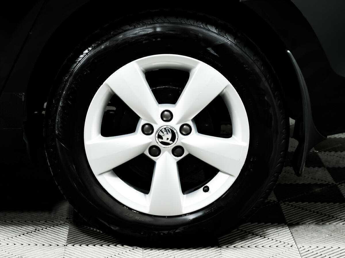 Skoda Rapid 2014 года с пробегом. Фото: #13