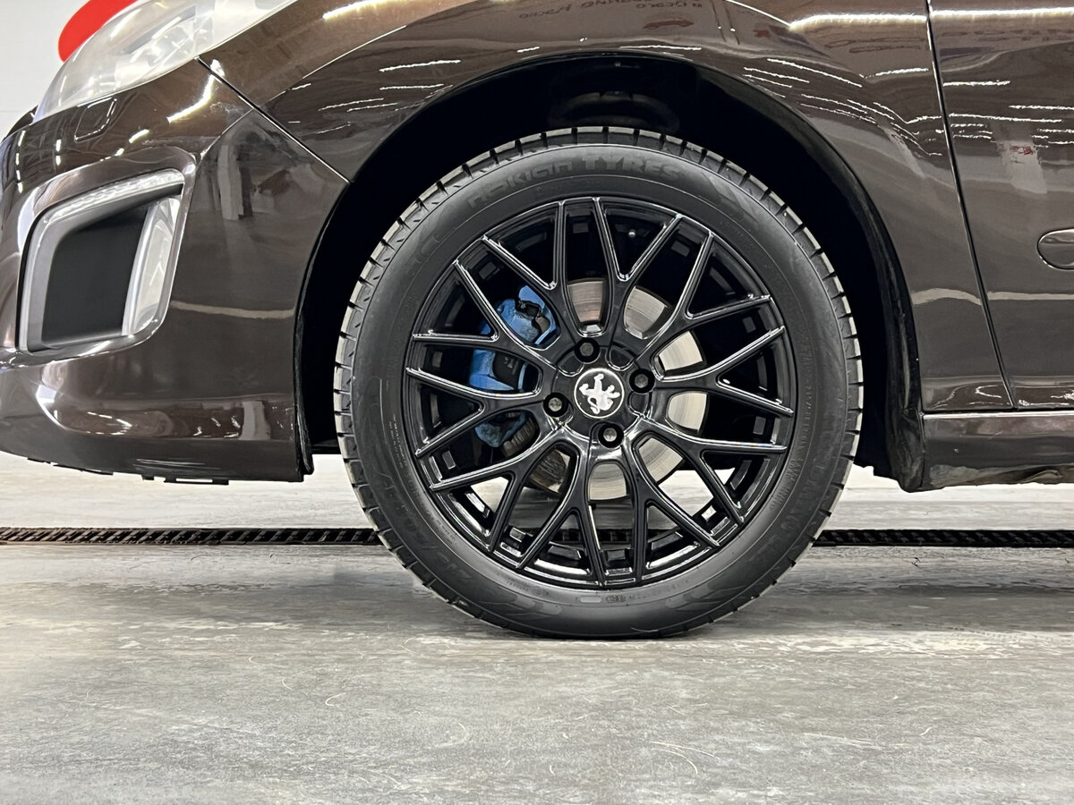 Peugeot 308 2012 года с пробегом. Фото: #16