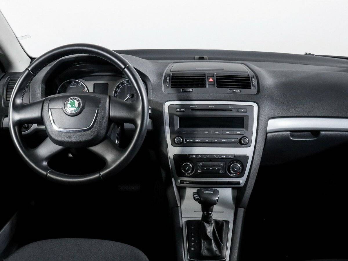 Skoda Octavia 2012 года с пробегом. Фото: #9