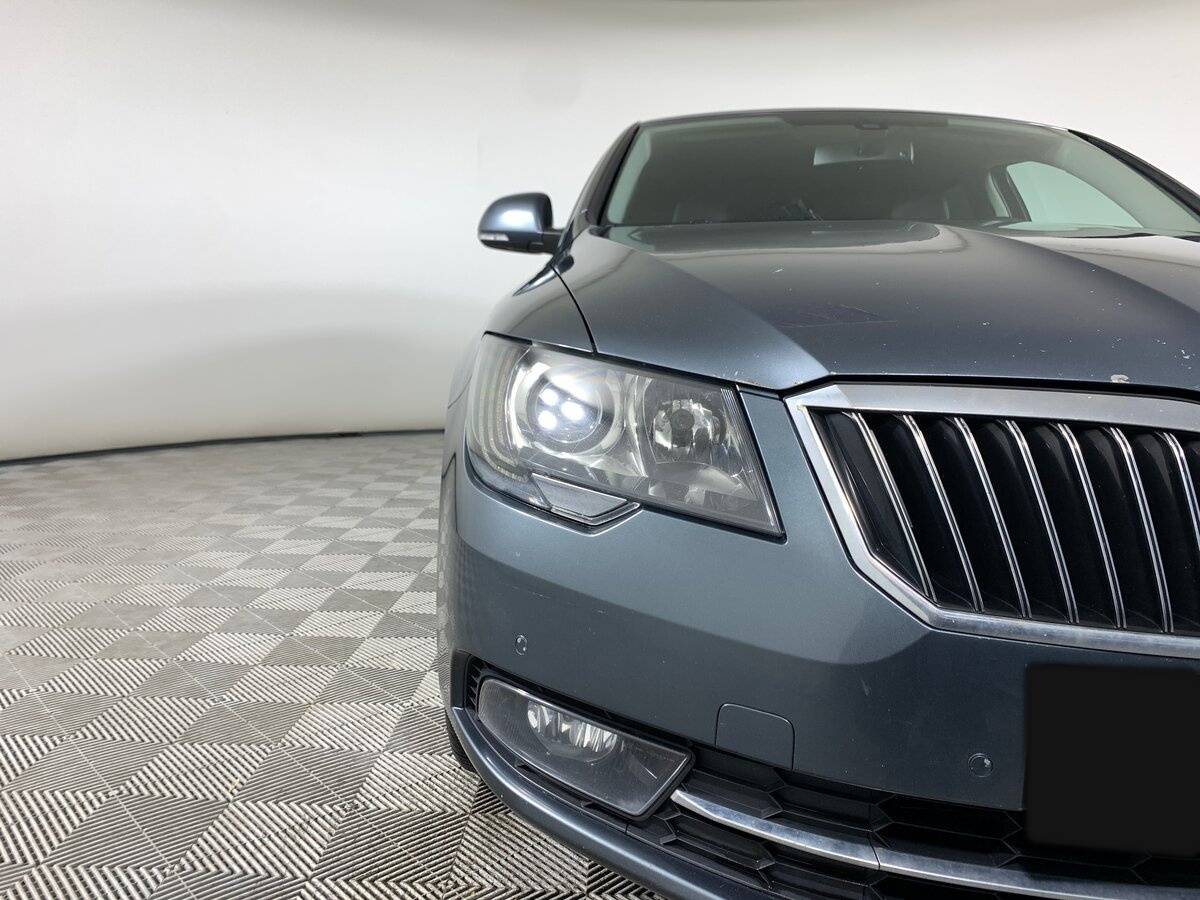 Skoda Superb 2014 года с пробегом. Фото: #9