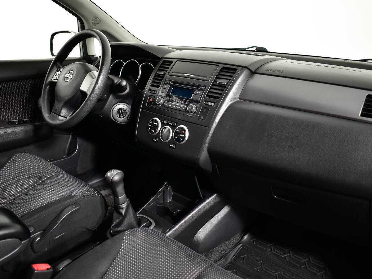 Nissan Tiida 2013 года с пробегом. Фото: #8