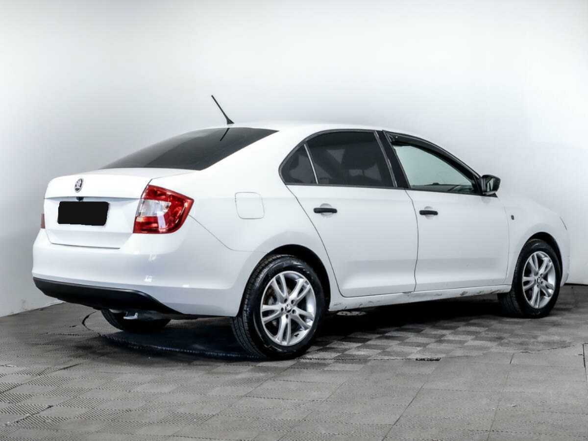 Skoda Rapid 2014 года с пробегом. Фото: #3
