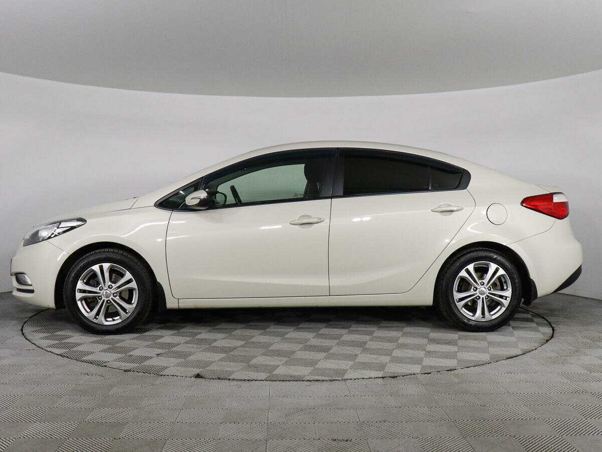 Kia Cerato 2013 года с пробегом. Фото: #7