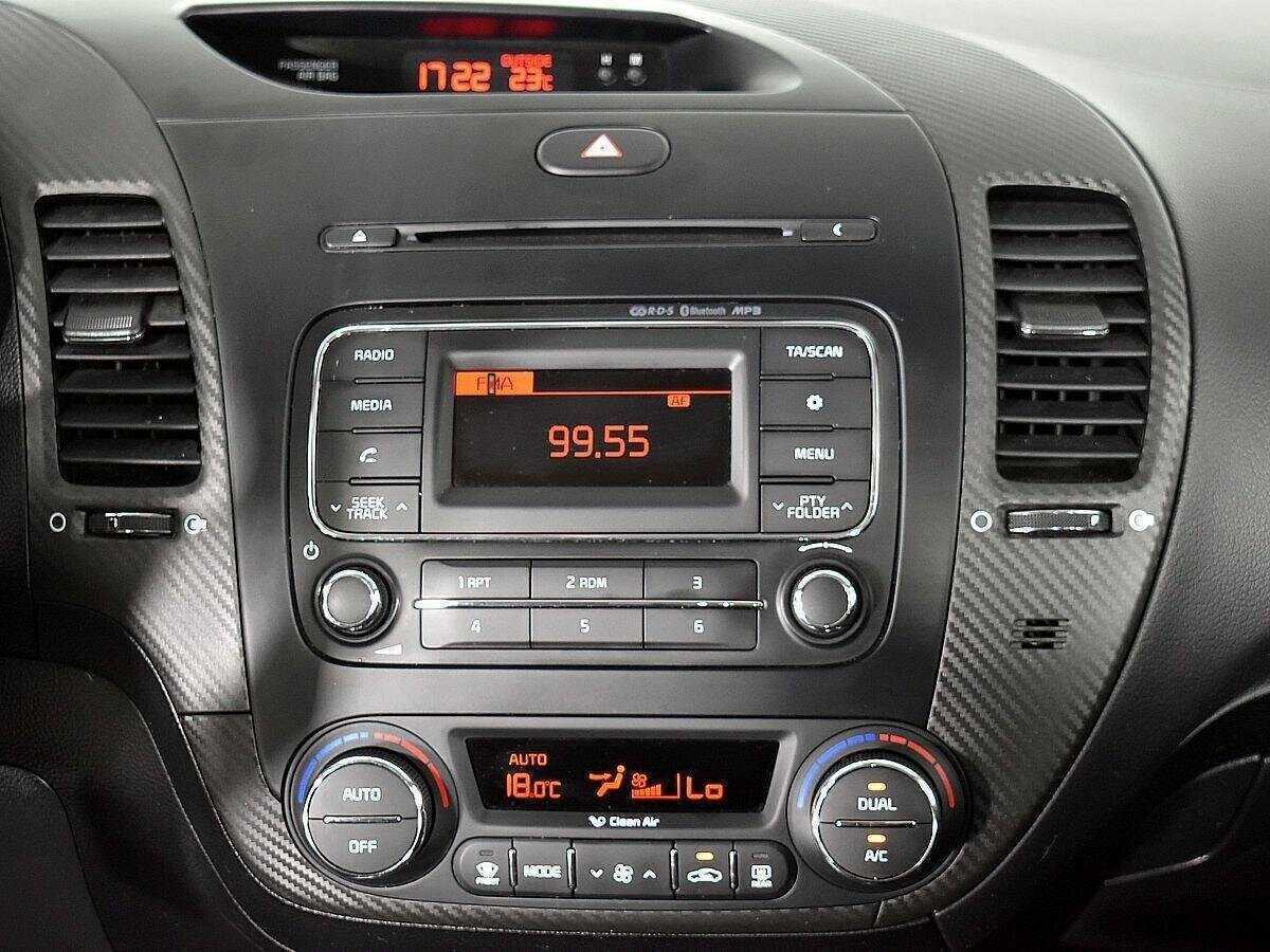 Kia Cerato 2013 года с пробегом. Фото: #12