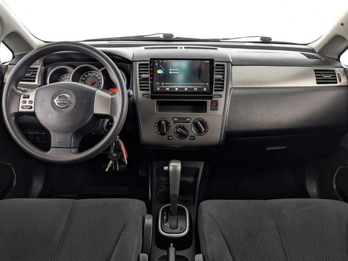 Nissan Tiida 2013 года с пробегом. Фото: #13