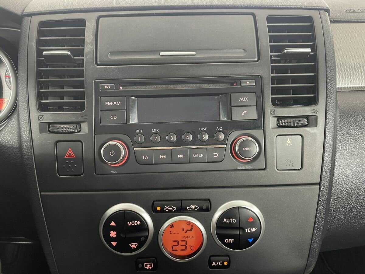 Nissan Tiida 2013 года с пробегом. Фото: #11