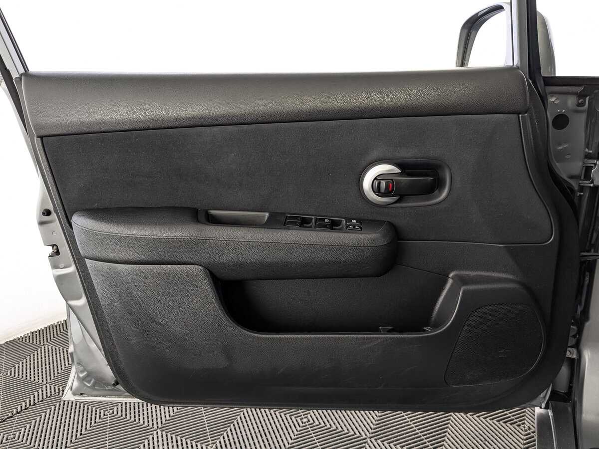 Nissan Tiida 2013 года с пробегом. Фото: #18