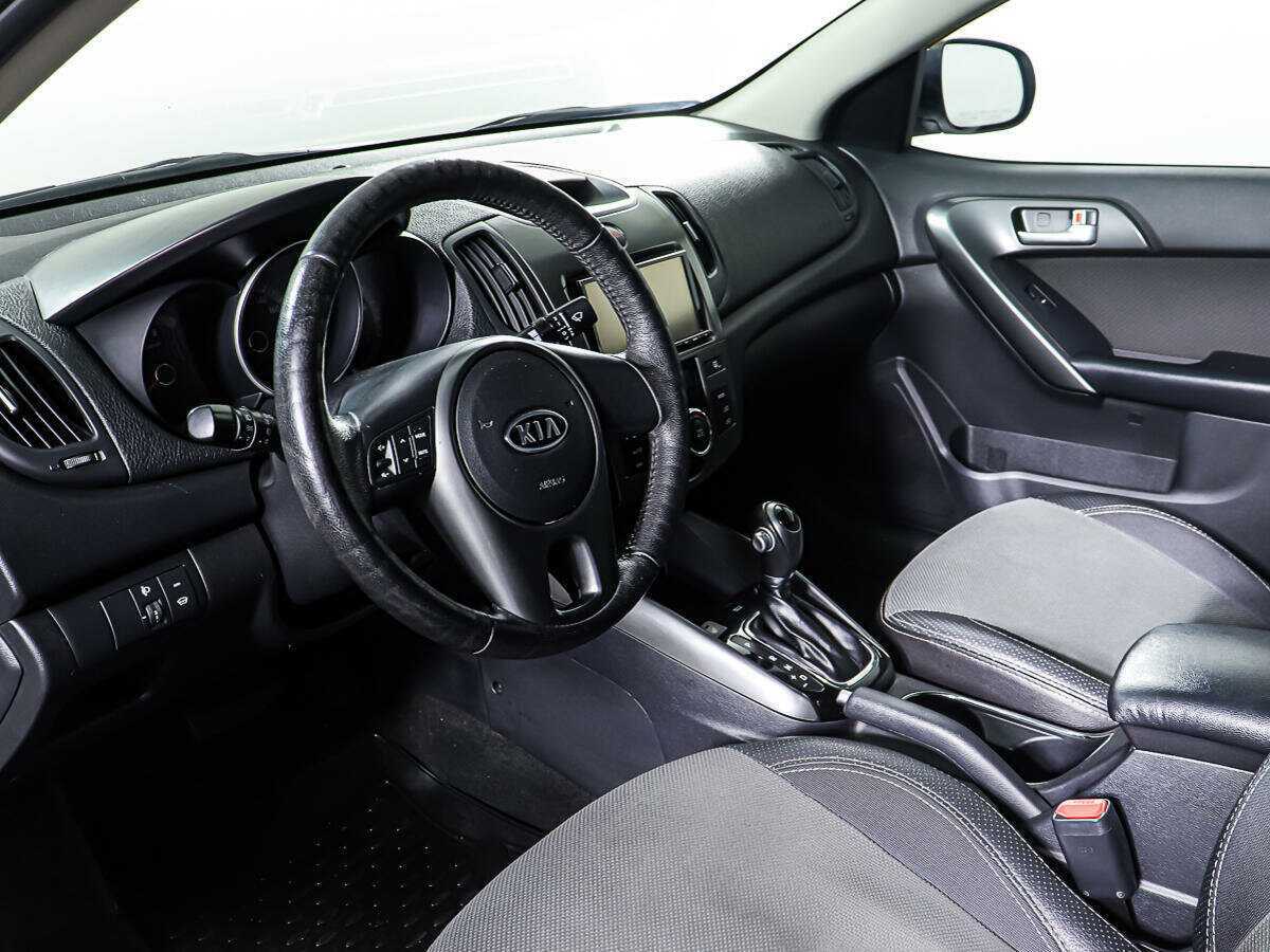 Kia Cerato 2012 года с пробегом. Фото: #14