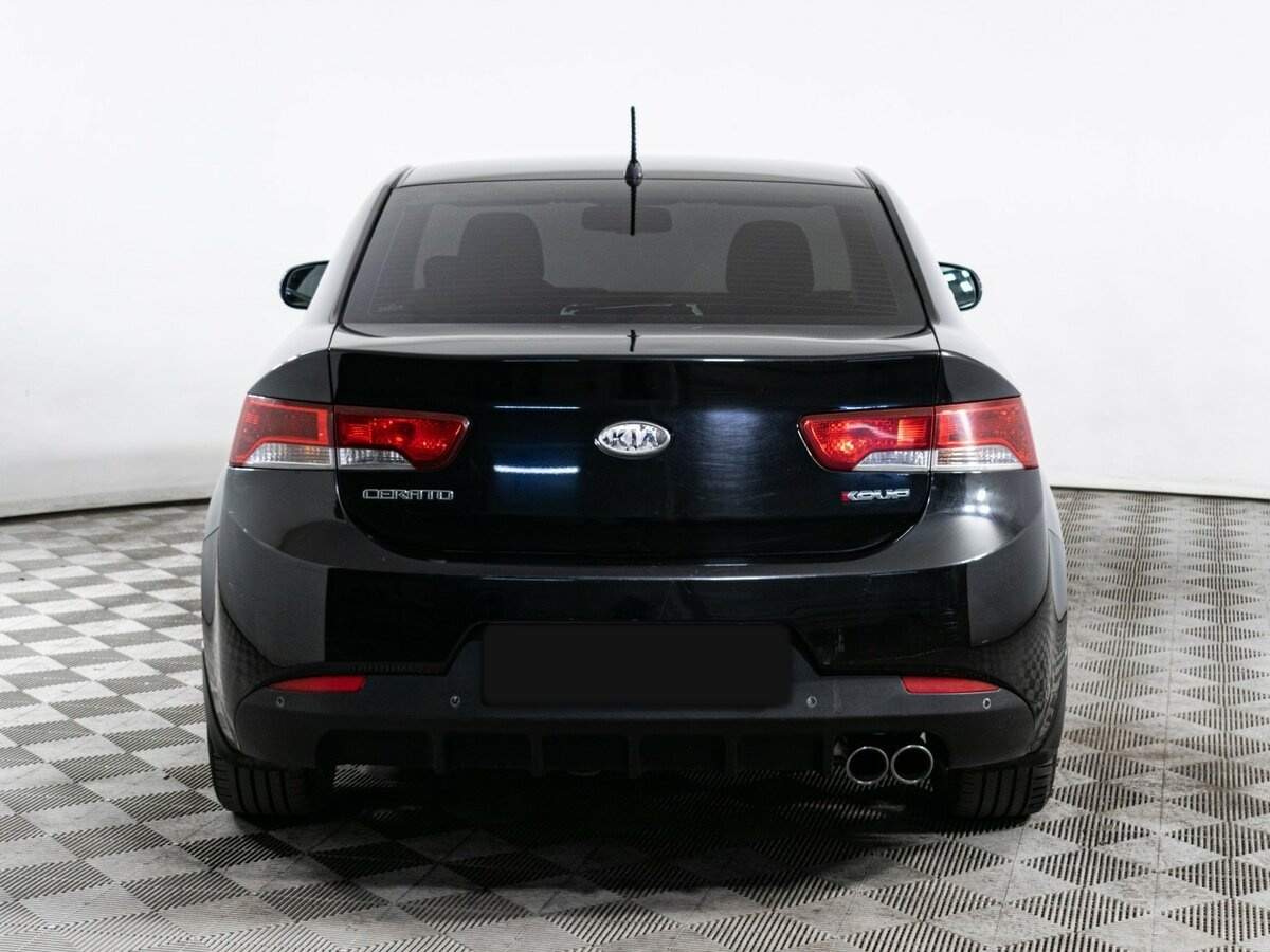 Kia Cerato 2012 года с пробегом. Фото: #5