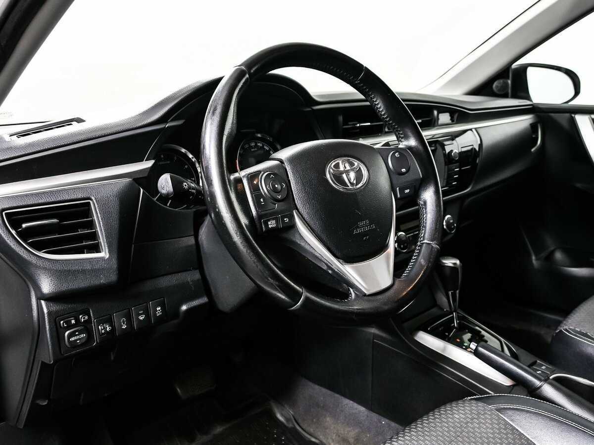 Toyota Corolla 2013 года с пробегом. Фото: #11