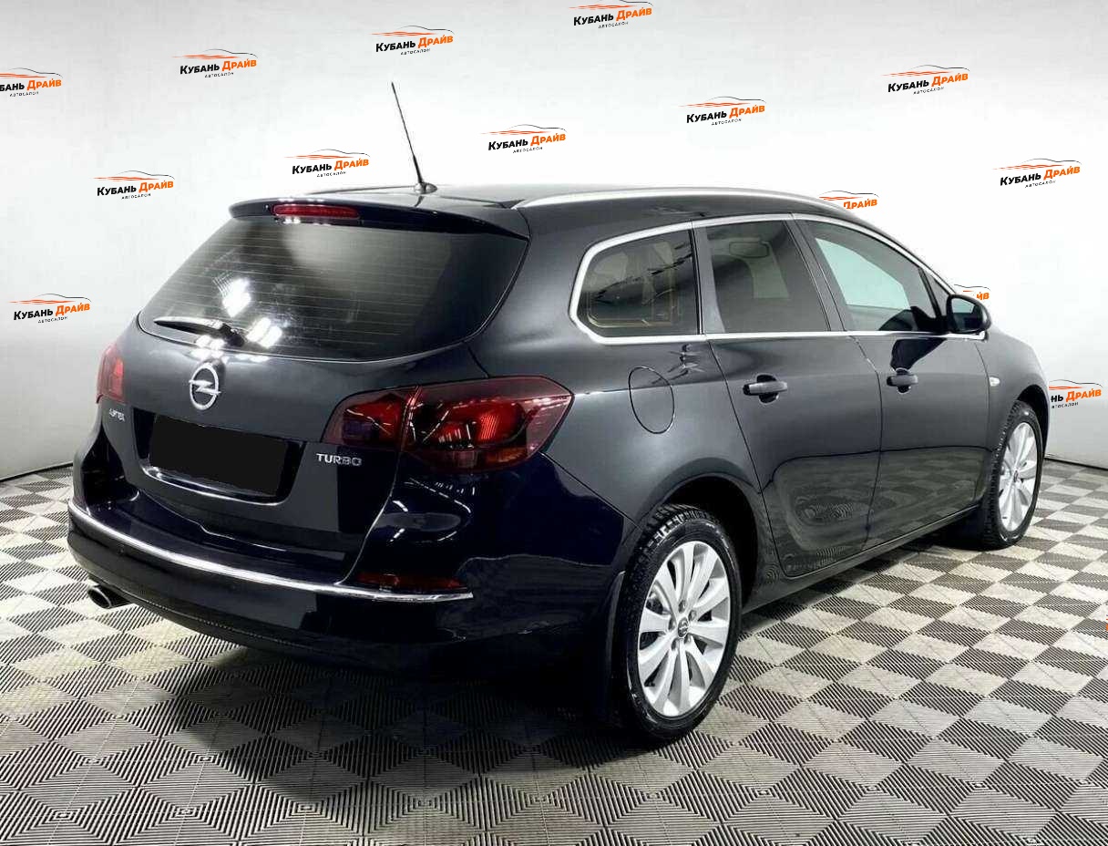 Opel Astra 2013 года с пробегом. Фото: #4