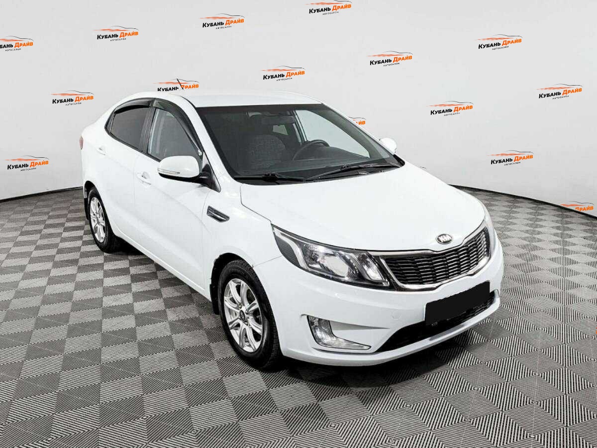 Kia Rio 2013 года с пробегом. Фото: #2