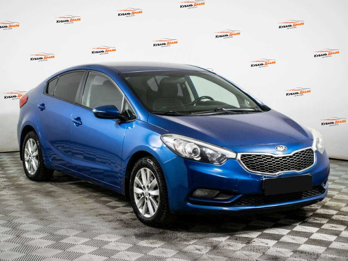 Kia Cerato 2014 года с пробегом. Фото: #2