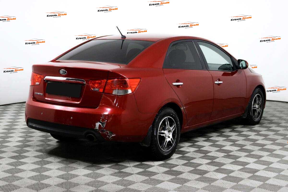 Kia Cerato 2012 года с пробегом. Фото: #4