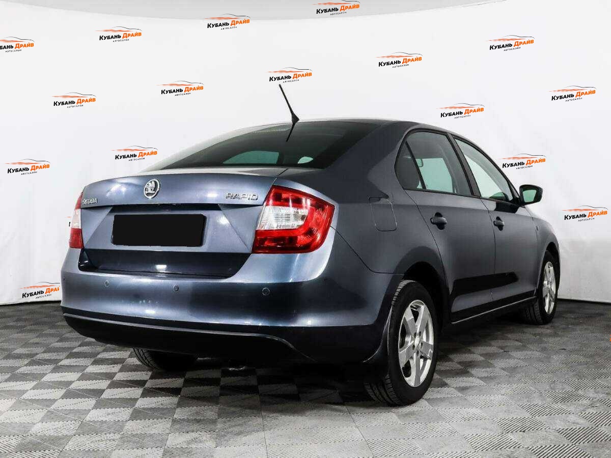 Skoda Rapid 2014 года с пробегом. Фото: #3