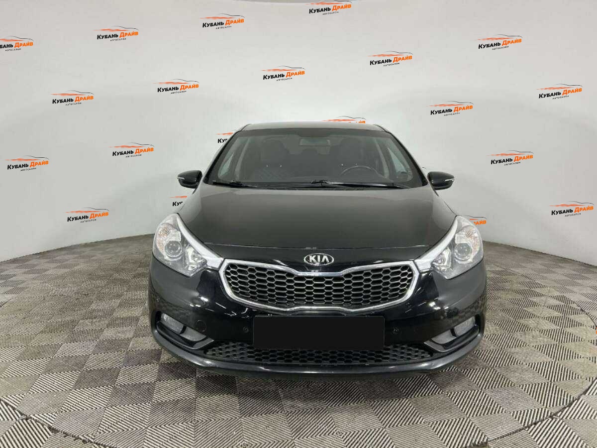 Kia Cerato 2014 года с пробегом. Фото: #1