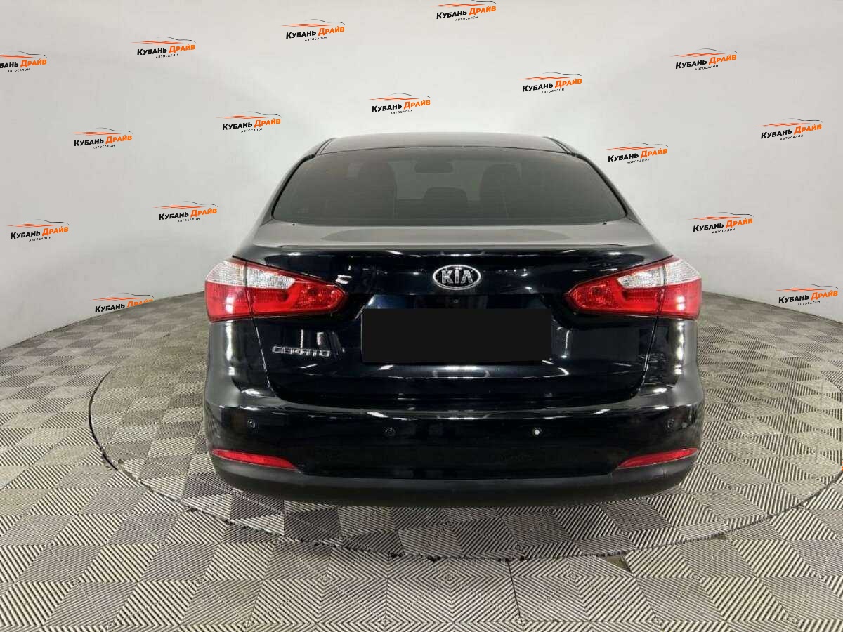Kia Cerato 2014 года с пробегом. Фото: #2